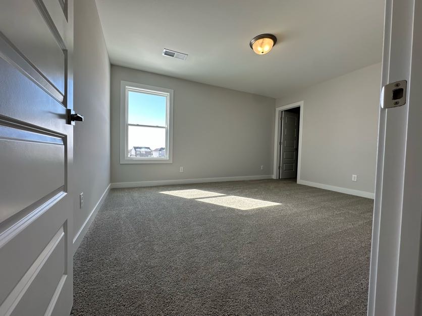 Professional interior painting with fresh coat on walls in Waukee Iowa home